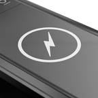 Dometic PJS1000 wireless charging pad charging a smartphone